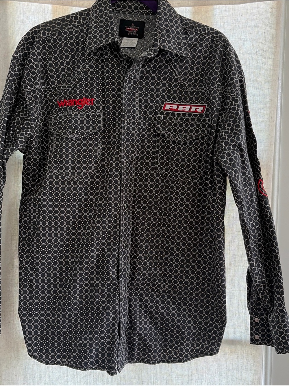 Wrangler Black Shirt with White Circular Pattern and Red Accents